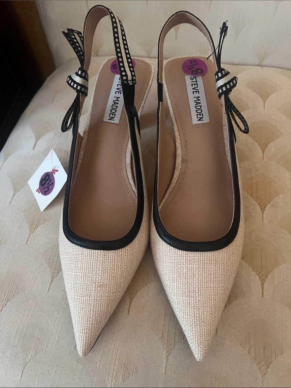 Steve Madden Beige Pointed Slingback heals with Black Trim and Bow Accent